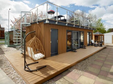 Garden retreats garden room with a hanging chair